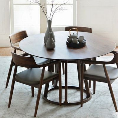 Muebles de comedor modernos Marco de madera sólida de nuez Mesa redonda de comedor con diseño único