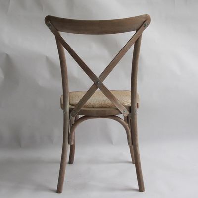 Diseños personalizados Nórdico Moderno Rattan Cruz Volte apilable de madera sólida Banquete de bodas silla de madera Servicio OEM aceptado