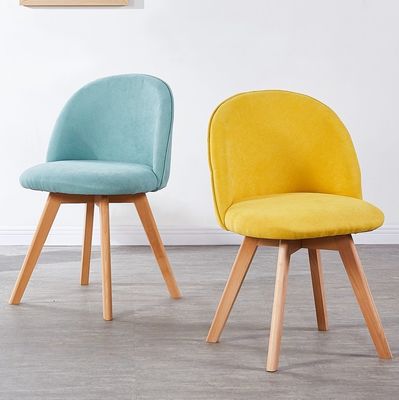 Silla de comedor de estilo nórdico moderno con patas de madera y asiento tapizado
