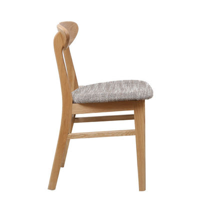 Silla de comedor nórdica moderna de madera sólida con asiento y respaldo de cuero tapizado