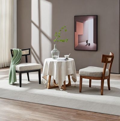 Silla de comedor de rotín de estilo nórdico silla de madera sólida tapizada para decoración de salón