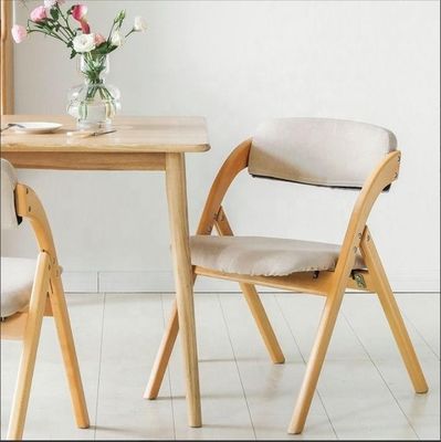 Silla de comedor plegable con patas de madera sólida y diseño moderno con material de tela o cuero PU