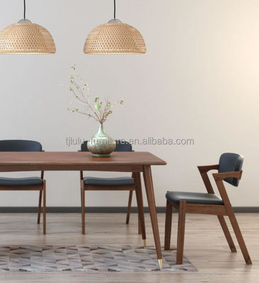Silla de comedor de cuero PU comercial de madera para cafetería de hotel versátil y funcional