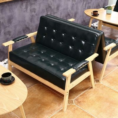 Silla confortable de diseño de madera con asiento de PU para comidas en hoteles en edificios de oficinas y cafeterías