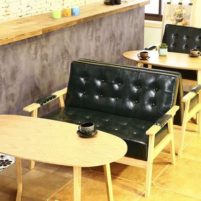 Silla confortable de diseño de madera con asiento de PU para comidas en hoteles en edificios de oficinas y cafeterías