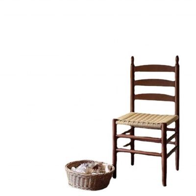 Silla de comedor de madera maciza con asiento de cuerda Una combinación perfecta de forma y función