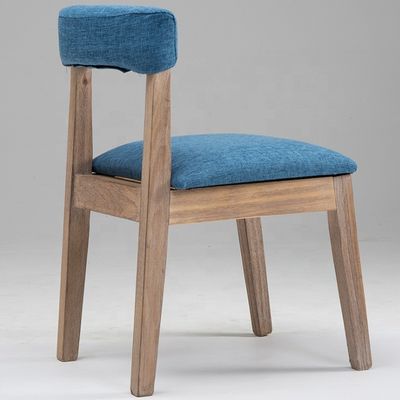 Buena silla de comedor de lujo personalizada con una exquisita mano de obra y material de pieles para el respaldo del asiento de madera