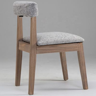 Buena silla de comedor de lujo personalizada con una exquisita mano de obra y material de pieles para el respaldo del asiento de madera