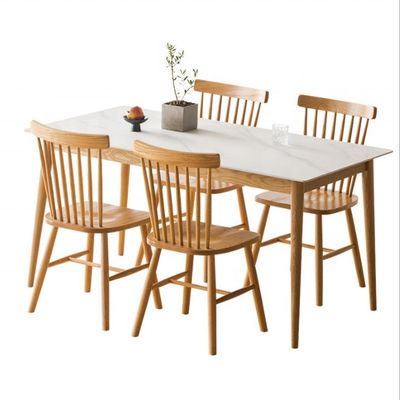 Exquisita mesa de comedor rectangular y combinación de sillas para el salón Muebles generales para el hogar