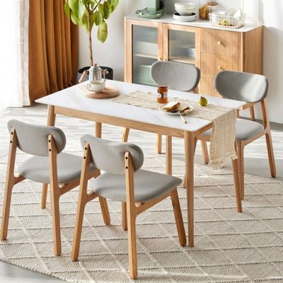 Exquisita mesa de comedor rectangular y combinación de sillas para el salón Muebles generales para el hogar