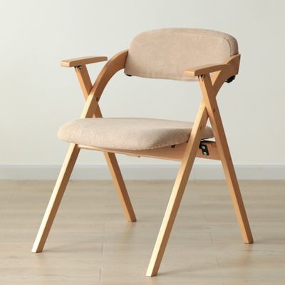 Silla de madera plegable con almohadillas La elección ideal para la experiencia de comer en restaurantes modernos