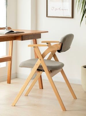 Silla de madera plegable con almohadillas La elección ideal para la experiencia de comer en restaurantes modernos