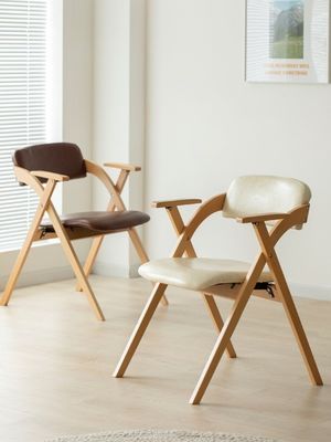Silla de madera plegable con almohadillas La elección ideal para la experiencia de comer en restaurantes modernos