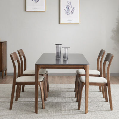Diseños personalizados Estilo de diseño Elegante silla de comedor de madera sólida nórdica con asiento de cuero de PU