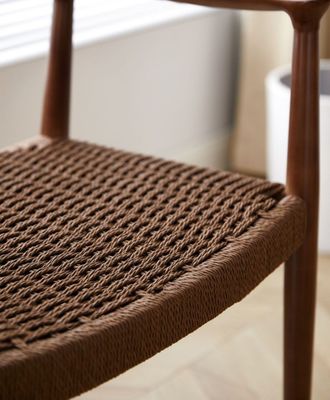 Silla de comedor de hotel de lujo con asiento de cordón tejido y construcción de madera sólida