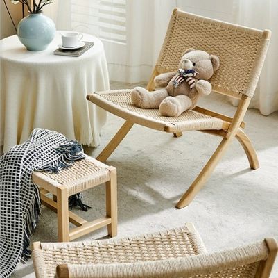 Muebles de salón de hotel estilo nórdico silla de ocio de madera maciza con cordón tejido y diseño plegable
