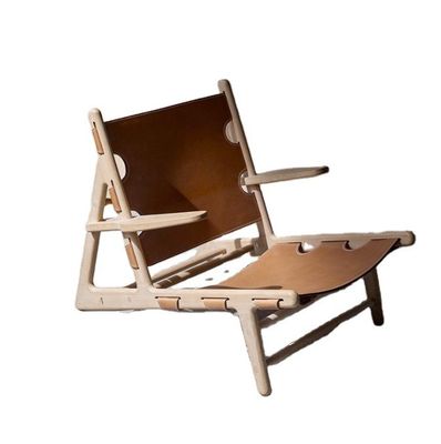 Silla de cuero de poliuretano de acabado de nitrolacquer moderno para sala de estar moderna y cómoda