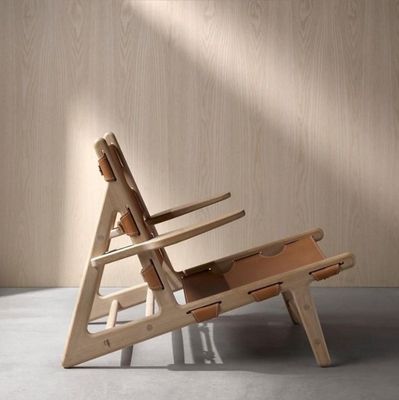 Silla de cuero de poliuretano de acabado de nitrolacquer moderno para sala de estar moderna y cómoda