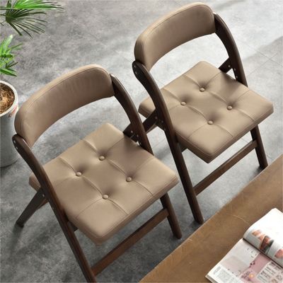 Silla plegable de madera sólida tapizada de cuero PU para restaurante hotel en estilo moderno nórdico