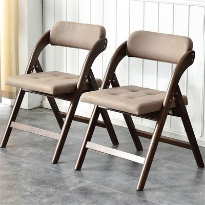 Silla plegable de madera sólida tapizada de cuero PU para restaurante hotel en estilo moderno nórdico