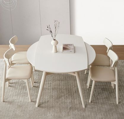 Silla de comedor de estilo nórdico con patas de madera maciza y cubierta de tela en acabado de nitrolaca