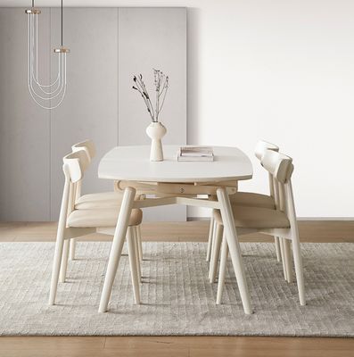 Silla de comedor de estilo nórdico con patas de madera maciza y cubierta de tela en acabado de nitrolaca