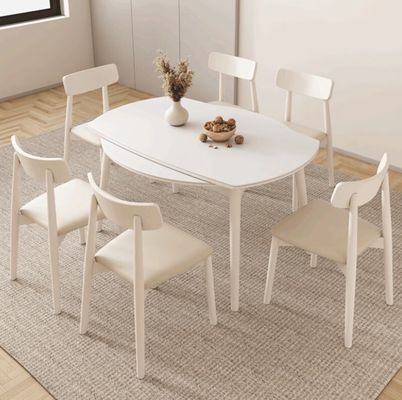 Silla de comedor de estilo nórdico con patas de madera maciza y cubierta de tela en acabado de nitrolaca