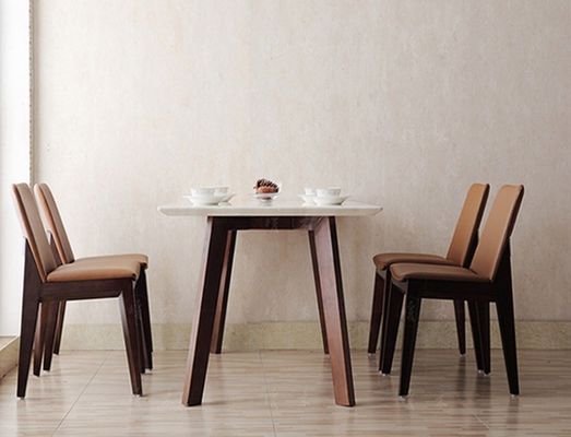 Silla de comedor estilo de madera de madera sólida de lujo diseño moderno material de cuero PU simple concisa para comer silla específica