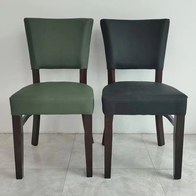 Tejido nórdico de cuero de PU Banquete Hotel Restaurante Evento Silla de comedor de madera con patas de madera y acabado de pintura NC / PU