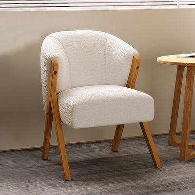 Silla de madera nórdica moderna Marco de madera sólida de ceniza resistente para diseño hotelero Sillones de sofá de madera de lana de cordero de terciopelo
