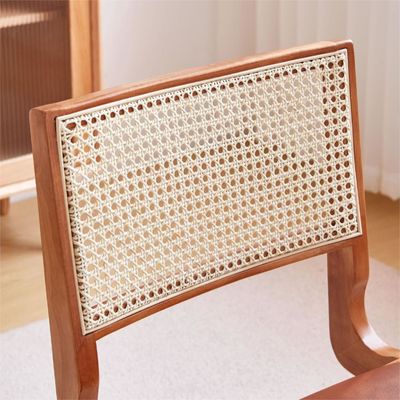 Silla de comedor de madera nórdica con asiento de rotín y acabado de nitrolacque