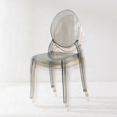 Silla de comedor moderno apilable hecha de material PC transparente para apilar en el salón del hotel café