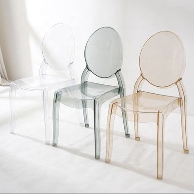 Silla de comedor moderno apilable hecha de material PC transparente para apilar en el salón del hotel café